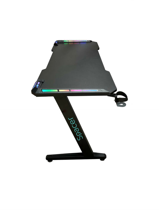 BIROU GAMING Spacer, dimensiuni 1400 x 600 x 18 mm, blat MDF invelit in fibra de carbon, suport casti, suport cana/pahar, picioare reglabile manual, RGB, telecomanda wireless 46501472 "SPGD-RGB-140-01" (timbru verde 0.45 lei)