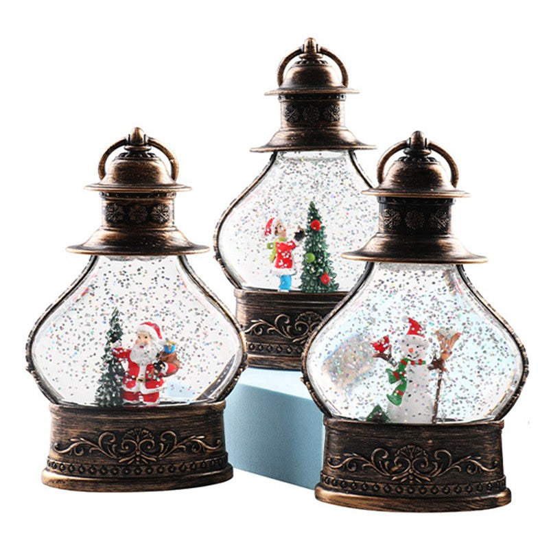 Decoratiune de Craciun tip Felinar, Glob de Cristal cu Fulgi de Zapada, Model Om de Zapada, Ornamentat cu Luminite Interioare, 14.5 x 9 x 3 cm, Rama Neagra, Transparent