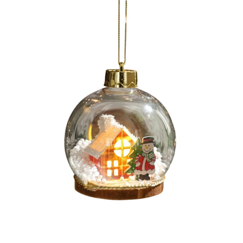 Glob pentru Bradul de Craciun LED, Model C, Glob Transparent cu Figurina Casa si Om de Zapada iluminat LED, Diametrul 10 cm, Baza Solida, Transparent