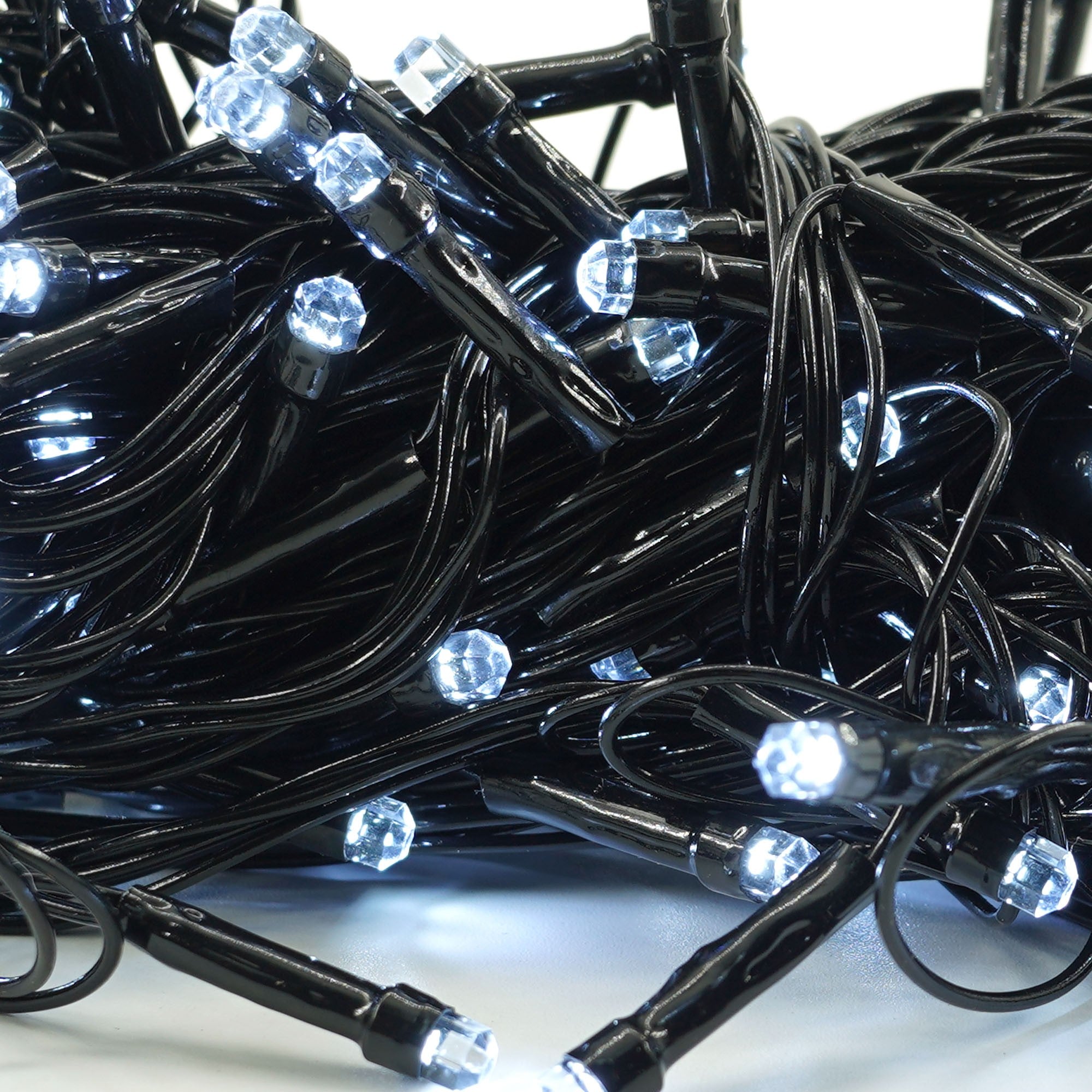 Instalatie Craciun YOTO Liniara 100 LED 9 m + 1 m Beculet cu 6 unghiuri Alb Rece fir negru