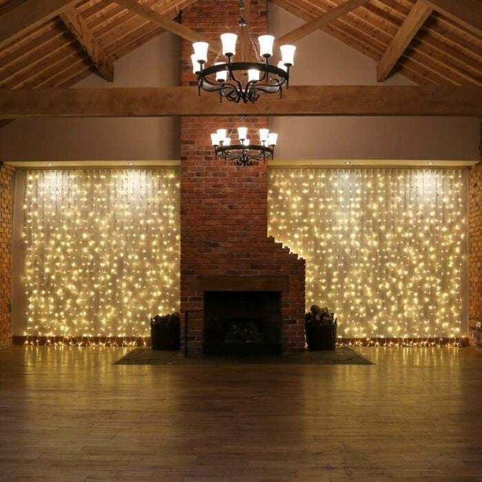 Instalatie Craciun, Tip Perdea, IP44, 9 m x 3 m, 720 LED-uri, Alb Cald, cu 8 jocuri de lumini, 31 V, 9W, Interconectabila, Prelungitor 3 m inclus, Fir transparent, Interior/ Exterior