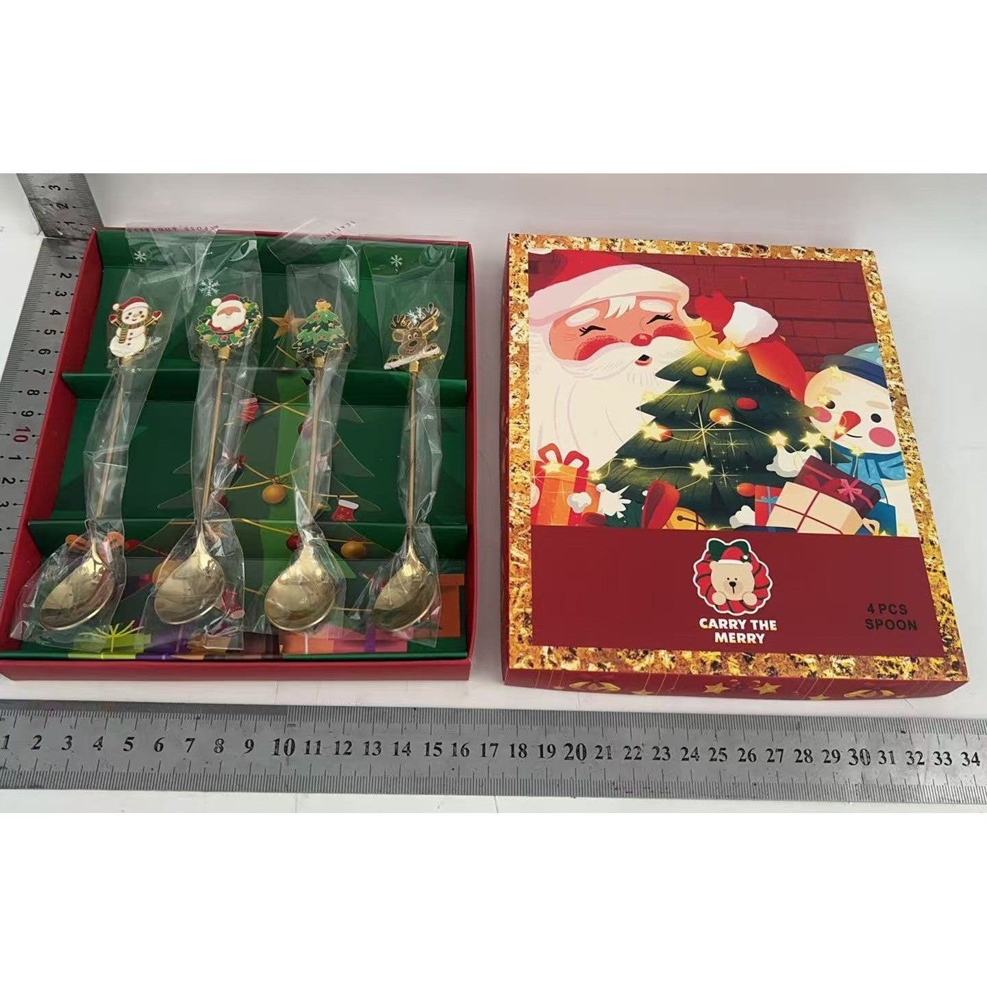Set 4 Lingurite, Tema Craciun, Model Carry The Merry, 4 Modele, din Otel Inoxidabil, 19.5 x 16 x 2 cm, Multicolor