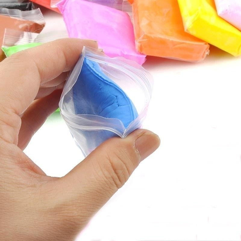 Set Plastilina inteligenta, modelatoare Magicul Clay, 12 pungi / set, multicolora, accesorii modelare incluse