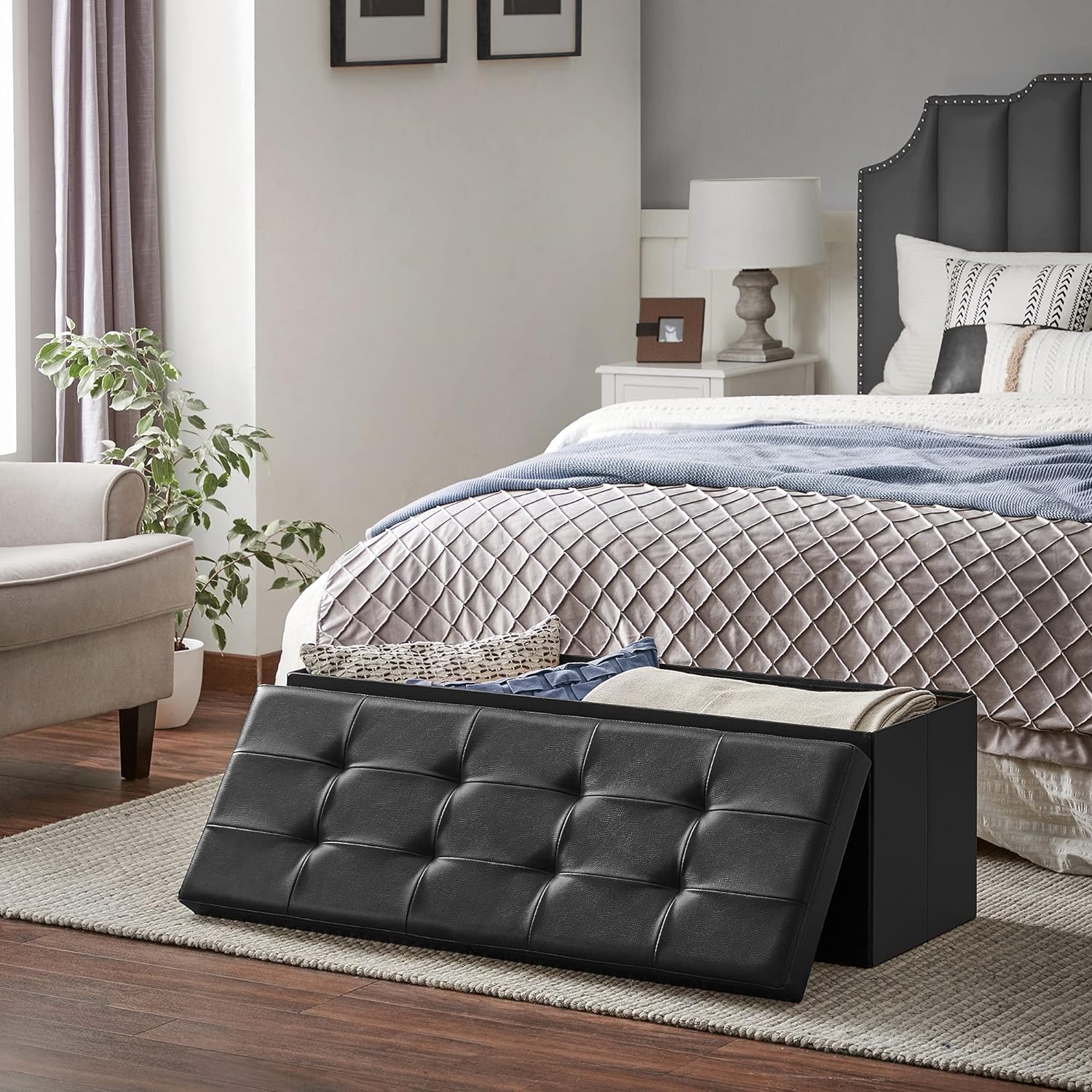 SONGMICS Taburet pliabil cu sezut moale, spatiu de depozitare 120litri, maxim 300kg, 110x38x38cm, negru