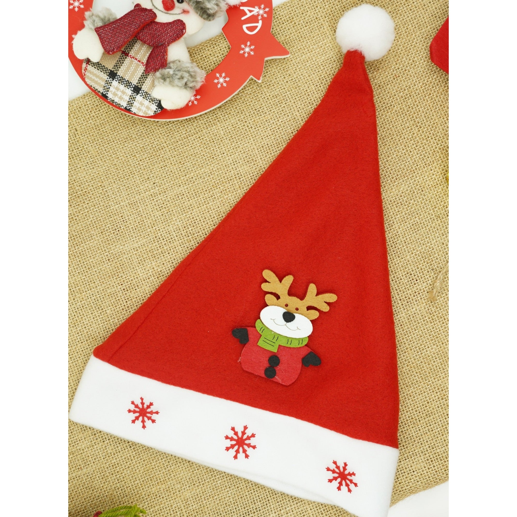 Caciulita de Mos Craciun,cu model de Ren si ornament fulg de nea, rosie, marime universala, material textil