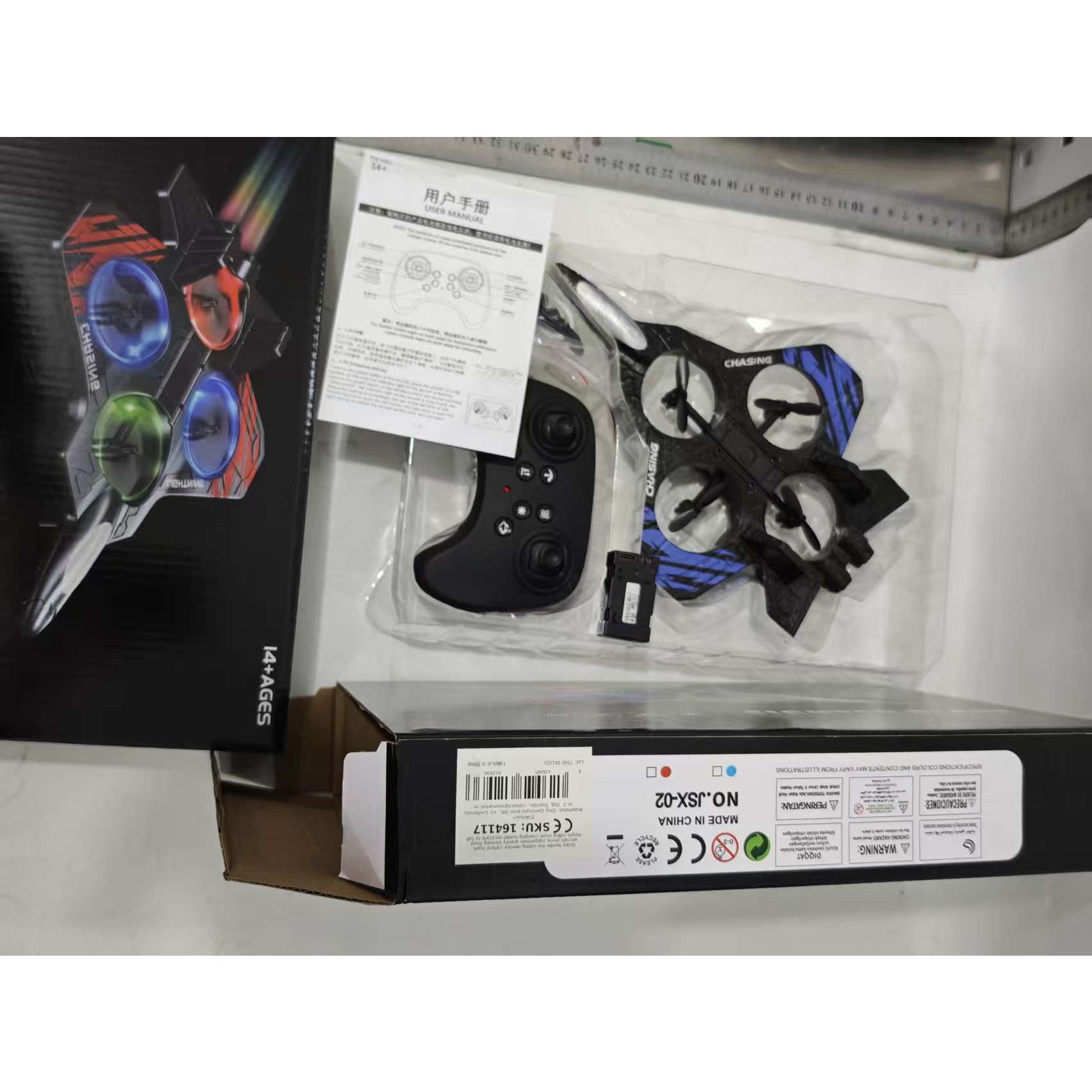 Avion de Lupta cu Telecomanda, Tip Drona, din EVA (Spuma), cu Telecomanda, Incarcare USB, 2.4 GHz, Rotire 360°, Zbor pana la 120 m, LED, 25.5 x 18 x 5.2 cm, Negru-Albastru