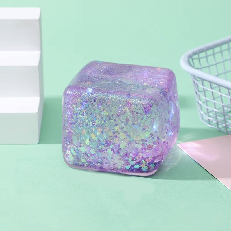 Jucarie Squishy tip Needoh in Forma de Cub, Model Sclipici, Antistres Senzoriala Comprimabila cu Revenire Lenta, 4.5x4.5x4.5 cm, 110 g, Culoare Mix