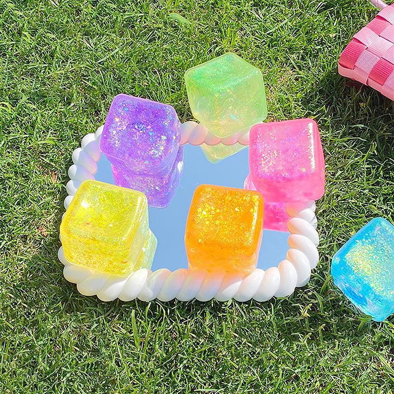 Jucarie Squishy tip Needoh in Forma de Cub, Model Sclipici, Antistres Senzoriala Comprimabila cu Revenire Lenta, 4.5x4.5x4.5 cm, 110 g, Culoare Mix