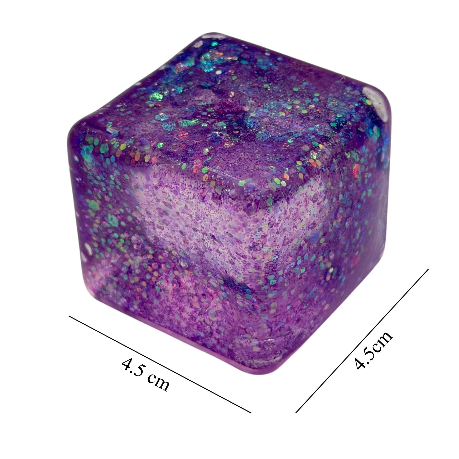 Jucarie Squishy tip Needoh in Forma de Cub, Model Ice Cube cu Sclipici Magic, Antistres Senzoriala Comprimabila cu Revenire Lenta, 4.5x4.5 cm, 110 g, Mov
