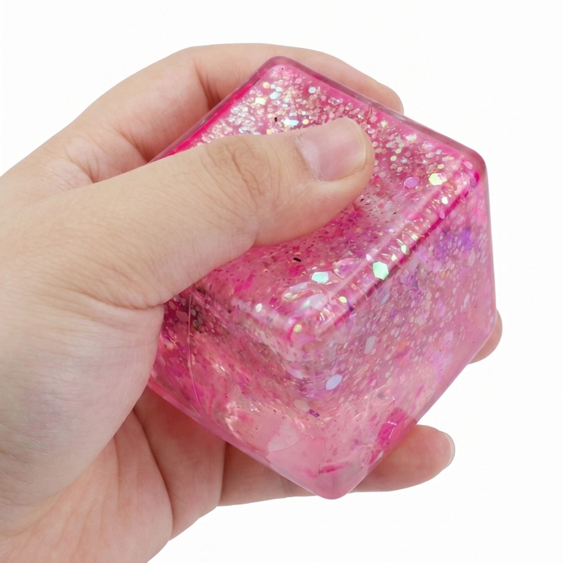 Jucarie Squishy tip Needoh in Forma de Cub, Model Ice Cube cu Sclipici Magic, Antistres Senzoriala Comprimabila cu Revenire Lenta, 4.5x4.5 cm, 110 g, Roz