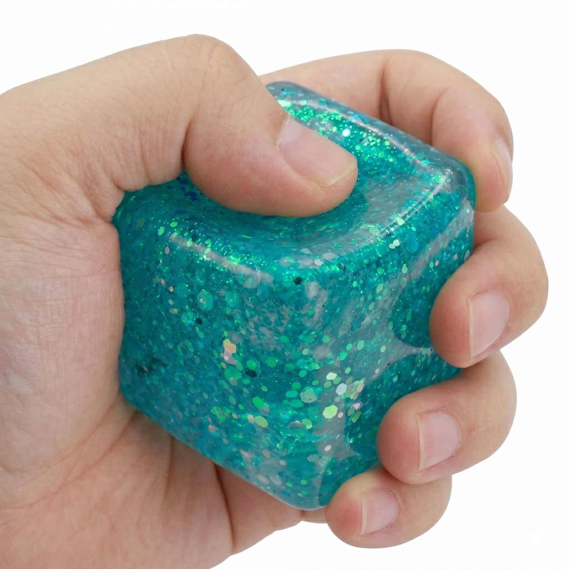 Jucarie Squishy tip Needoh in Forma de Cub, Model Ice Cube cu Sclipici Magic, Antistres Senzoriala Comprimabila cu Revenire Lenta, 4x4 cm, 80 g, Albastru