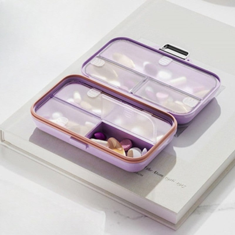Cutie Medicamente, Mov, 7 Compartimente, Portabila si Compacta, 11x7.2x3.5 cm, Ideala pentru Uzul Cotidian