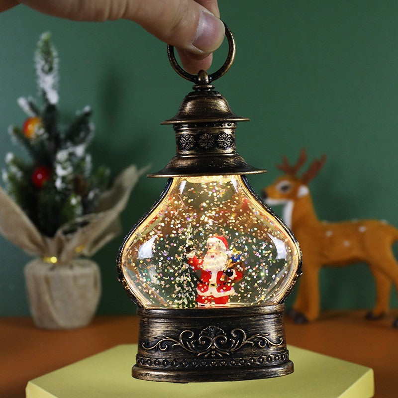 Decoratiune de Craciun tip Felinar, Glob de Cristal cu Fulgi de Zapada, Model Mos Craciun, Ornamentat cu Luminite Interioare, 14.5 x 9 x 3 cm, Rama Neagra, Transparent