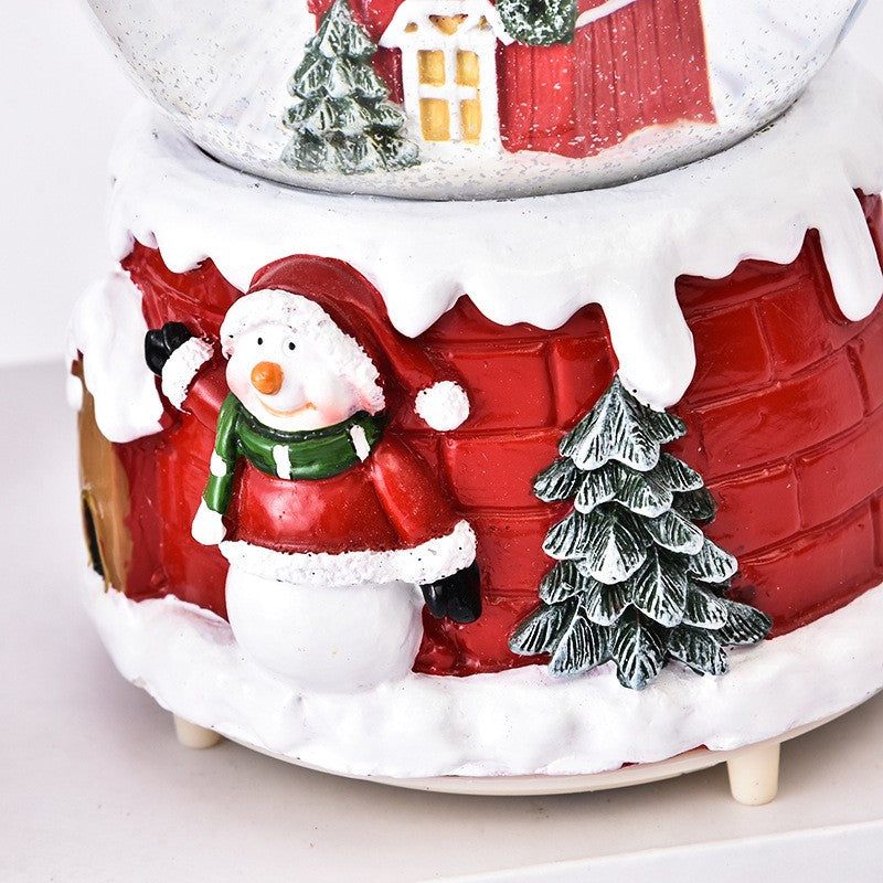 Decoratiune glob cu zapada Mos Craciun pe casa, model 2, diametru 6.5 cm, multicolor