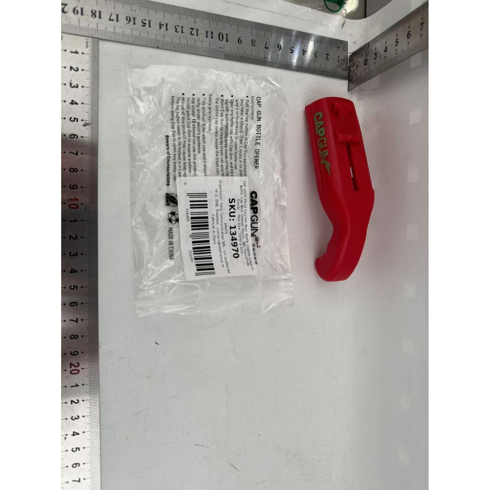 Deschizator de sticle, Model Pistol, Plastic, ABS, pentru Dopuri Metalice, 13 x 6 x 3.7 cm, Rosu