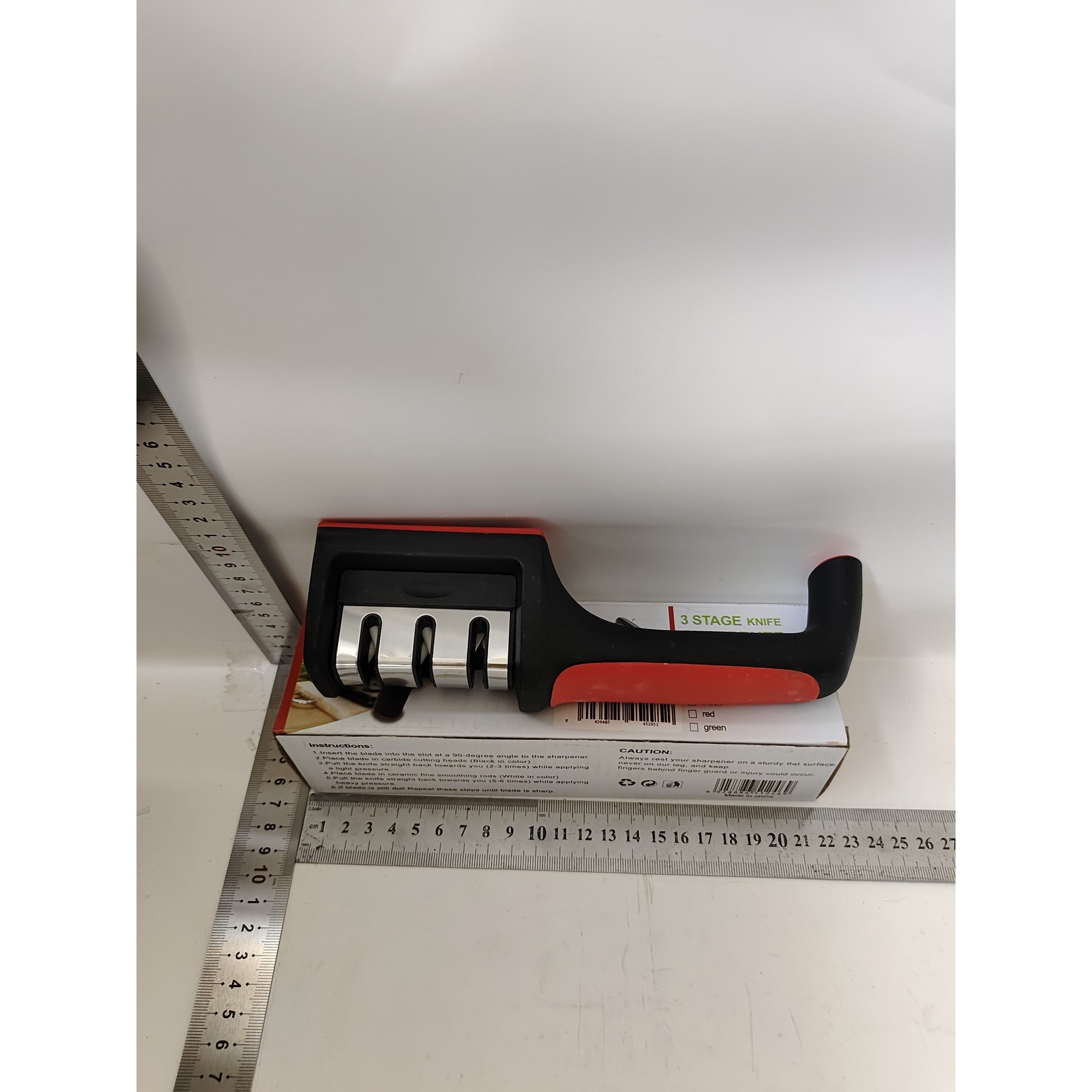 Dispozitiv pentru ascutit cutite cu 3 pozitii, rosu/negru, material inox si ABS, 21.5x5x6 cm