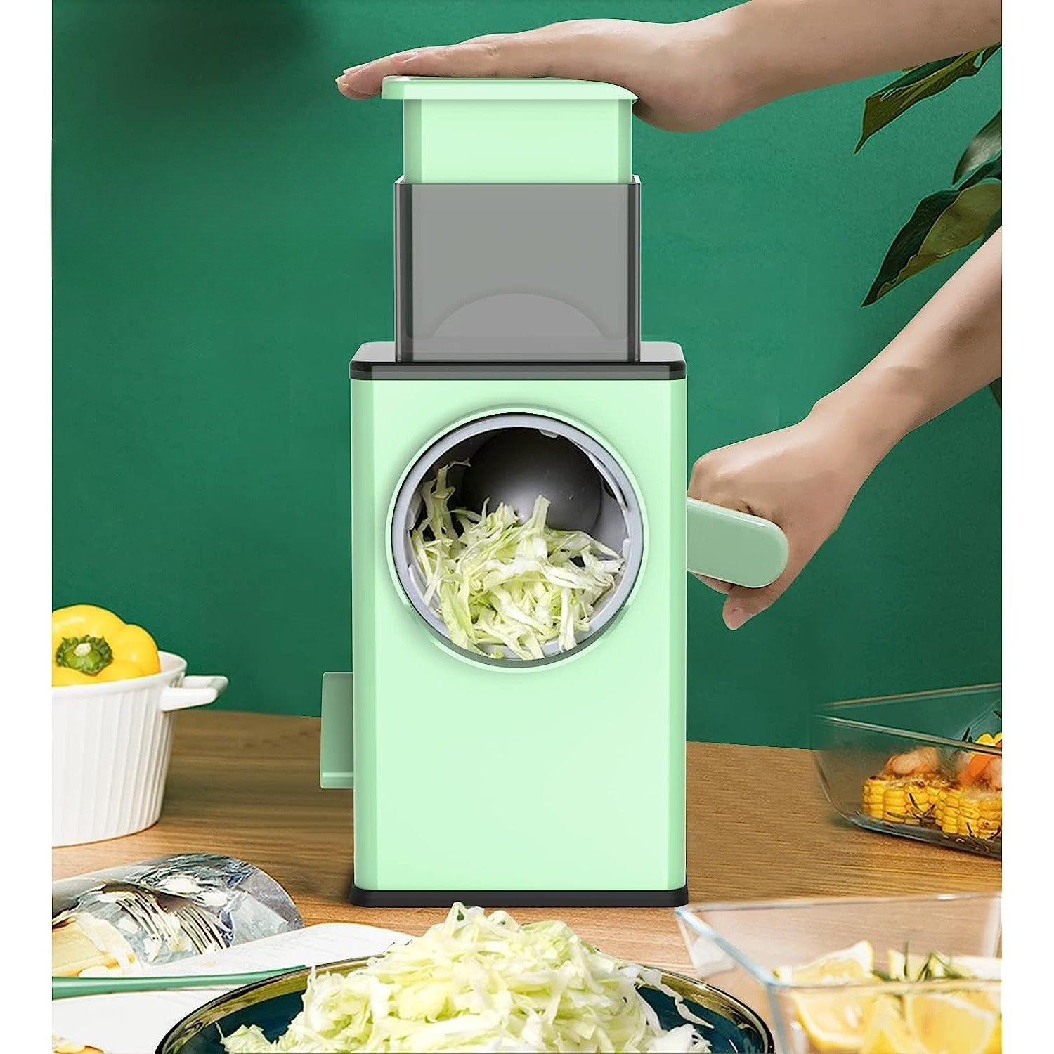 Feliator manual pentru legume 3 lame din otel inxodabil, 3 tipuri de feliere, material carcasa ABS, latime maxima feliere 4 mm, baza de tip ventuza, usor si sigur de utilizat, 28.5 x 9,2 x 13.5 cm, verde