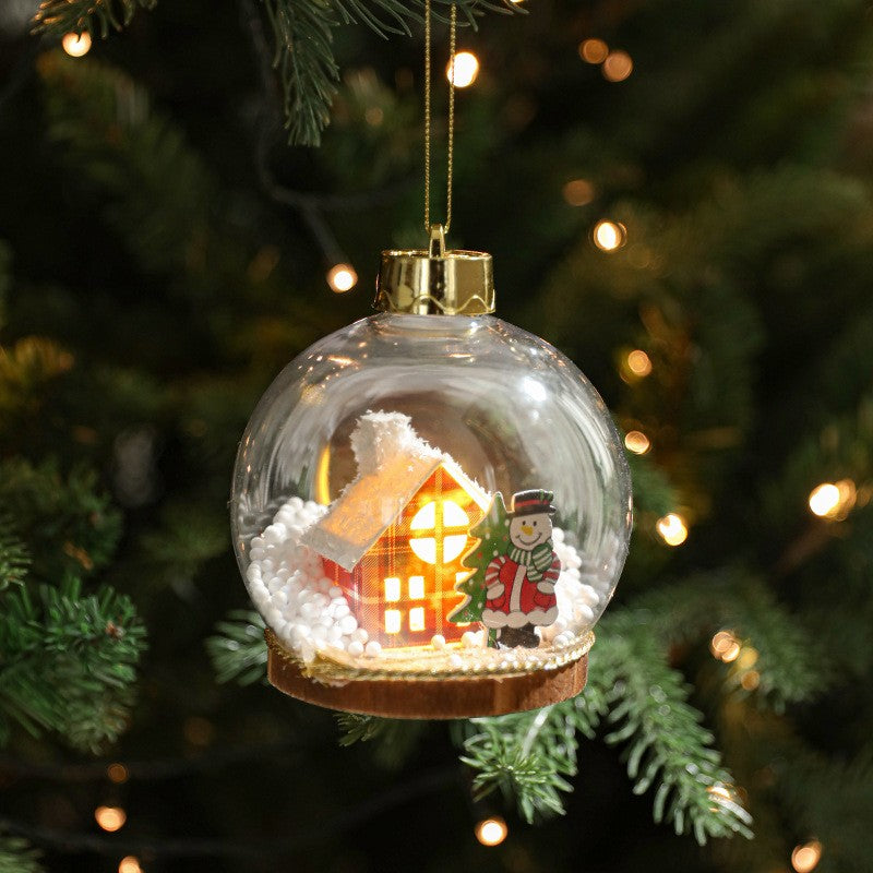 Glob pentru Bradul de Craciun LED, Model C, Glob Transparent cu Figurina Casa si Om de Zapada iluminat LED, Diametrul 10 cm, Baza Solida, Transparent