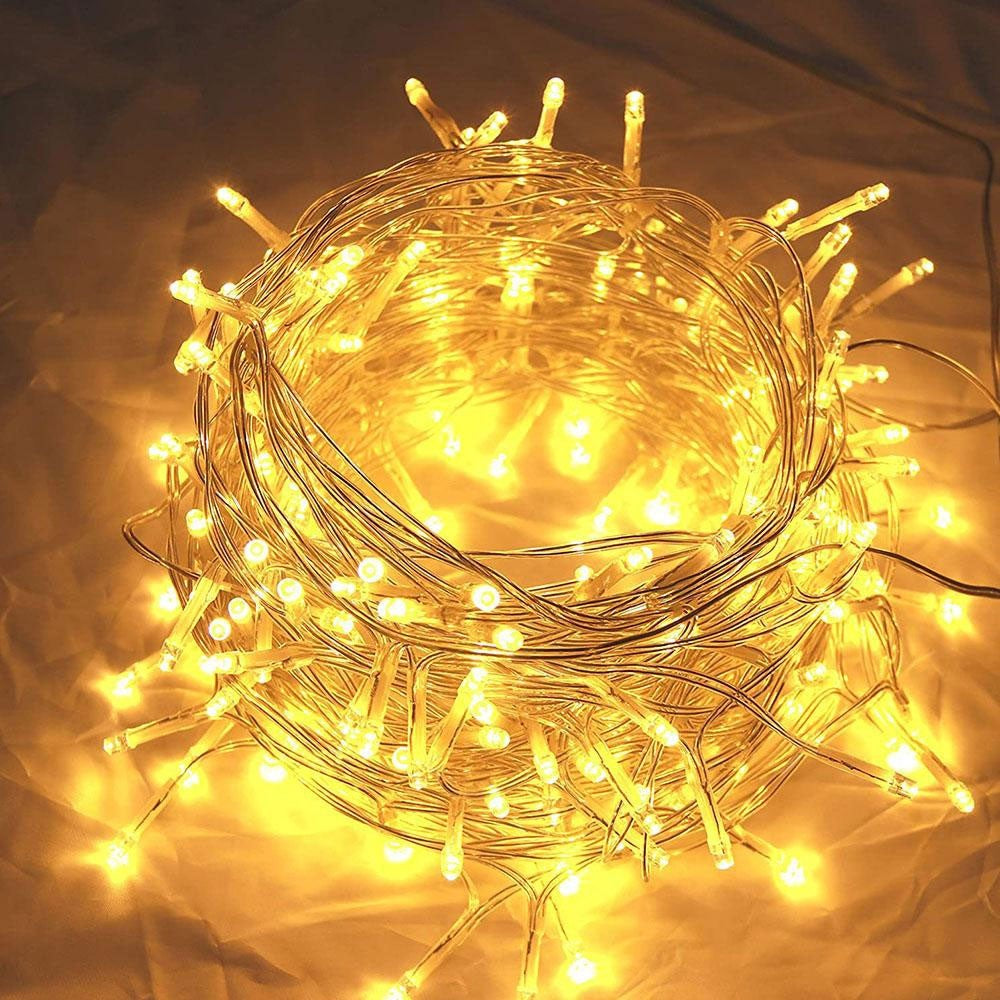Instalatie Craciun Tip Turturi, IP44, 25 m, 715 Led-uri, Alb cald, 8 jocuri de lumini, 31 V, Telecomanda inclusa, Interconectabila, Prelungitor 3 m inclus, Fir Cupru, Interior/Exterior