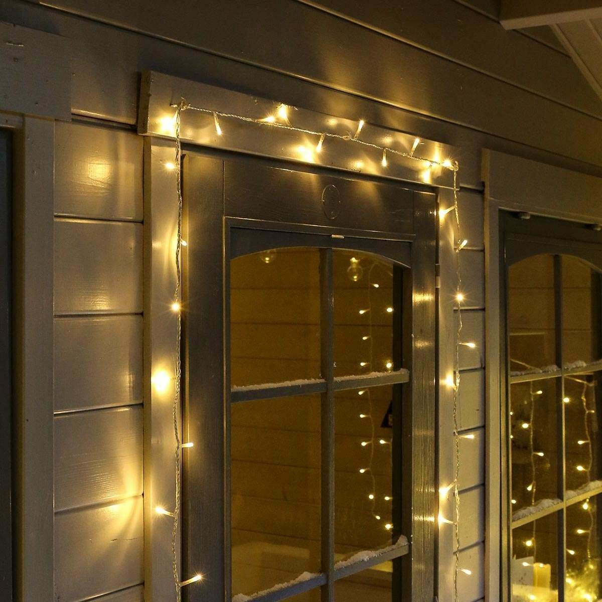 Instalatie Craciun, 40 m, 400 Led-uri,Liniara, Alb cald, 8 jocuri de lumini, Transformator, Interconectabila, Prelungitor 5 m inclus, Fir Transparent