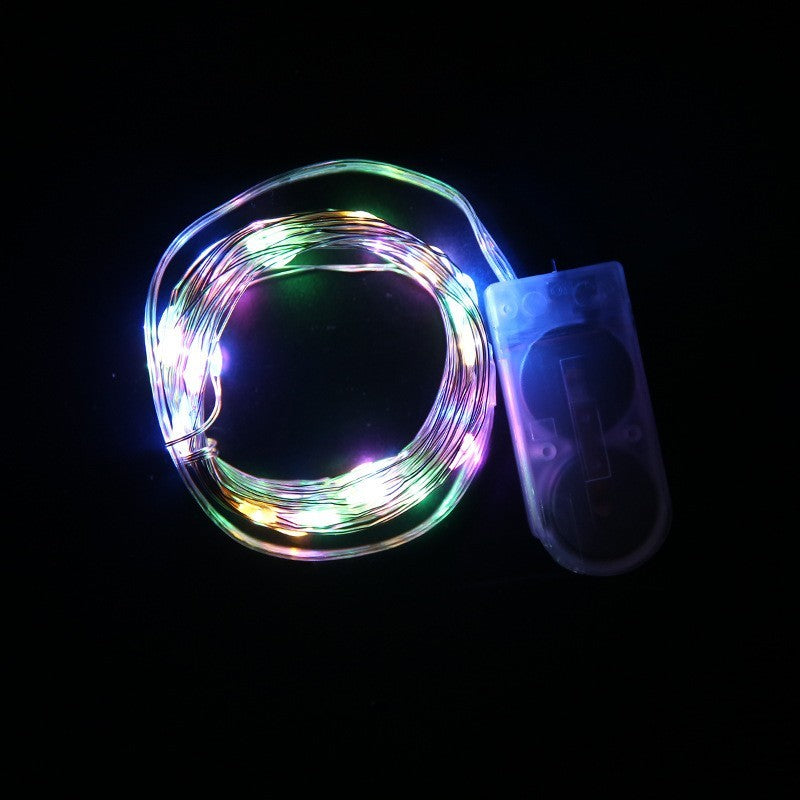 Instalatie Craciun, 5 metri, 50 LED-uri, Multicolor, cu baterii CR 2032 incluse, fir cupru, liniar, interior/exterior
