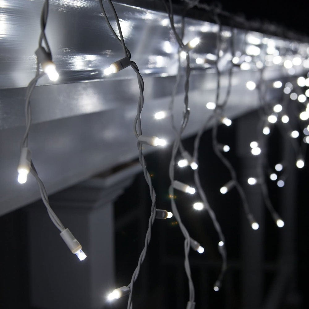 Instalatie Craciun Turturi, IP44, 10 m, 286 Led-uri,Perdea Franjurata, Alb rece, 8 jocuri de lumini, Transformator 31 V, Putere 9 W, Interconectabila, Interior/Exterior, Prelungitor 3 m inclus, Fir Transparent