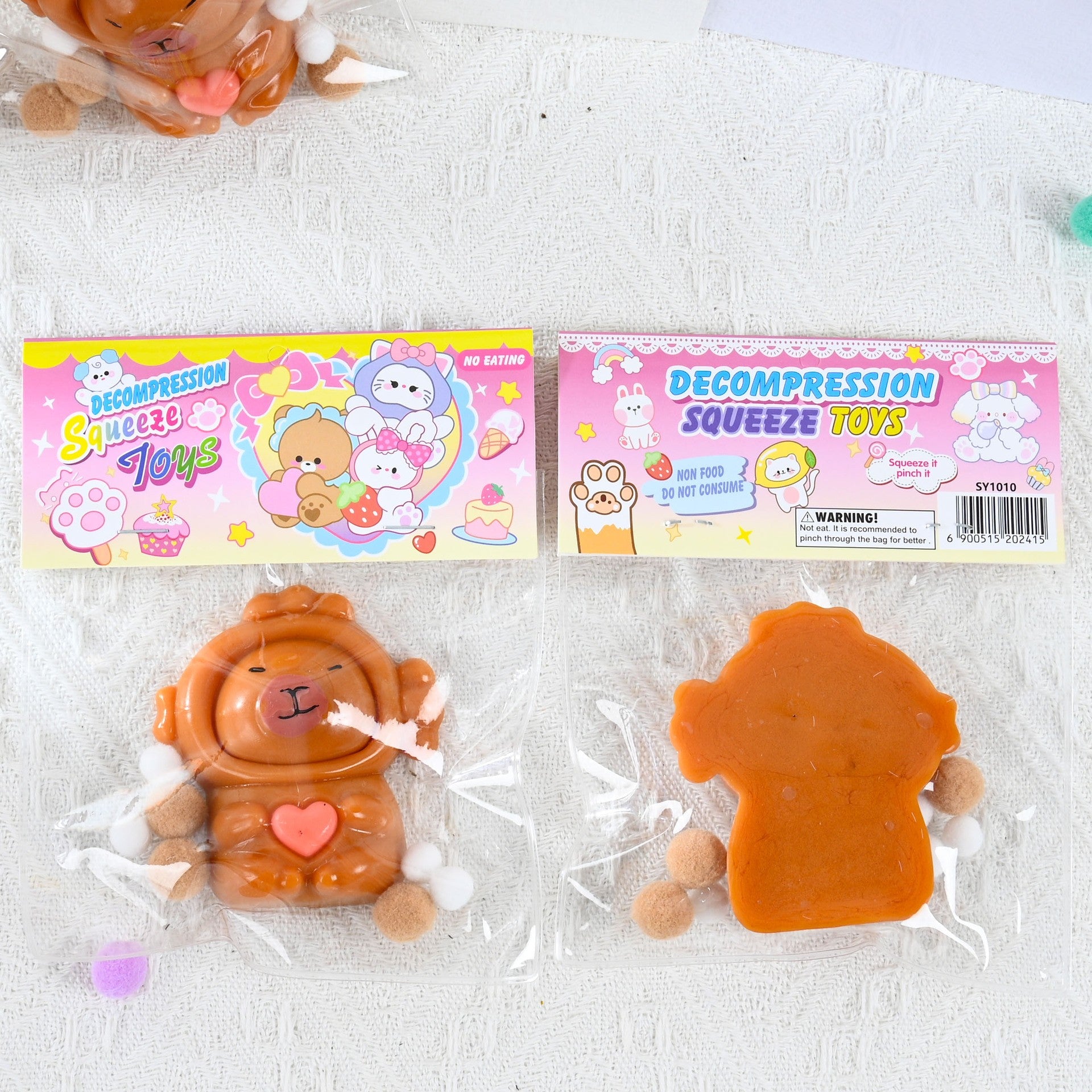 Jucarie Antistres Squishy, cu Revenire Lenta, Model Capybara cu Inima, 7.5cmx6.5 cm, din TPR, Ambalaj Transparent, Maro