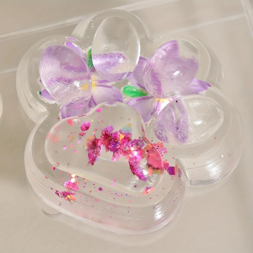 Jucarie Antistres Squishy, Labuta de Pisica Pufoasa, cu Revenire Lenta, 7 x 6.5 cm, Model Flori 2, Transparent