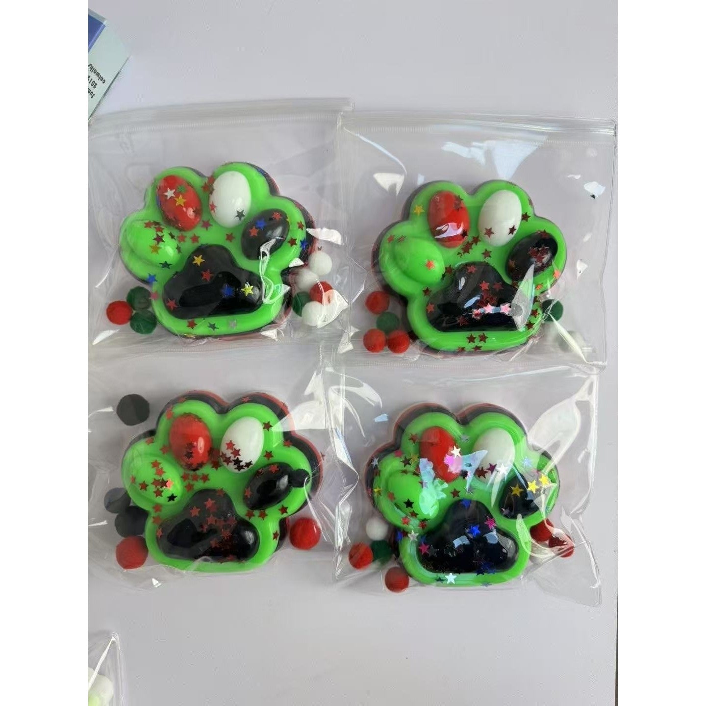 Jucarie Antistres Squishy, Flippy, cu Revenire Lenta, Modele diverse, 220g, 12.5 x 10.5 cm Squeeze Pinch Family, Ambalaj Transparent