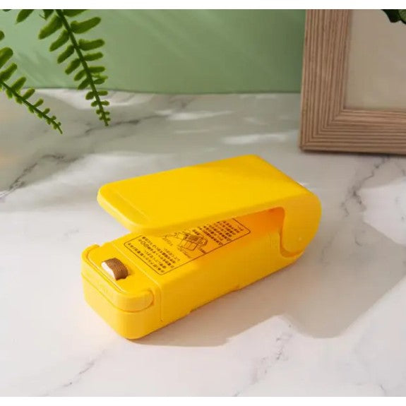 Mini Aparat de Sigilat Pungi cu Baterii, Etansare prin Caldura, Spate Magnetic, Portabil, 9.7x3 cm, Galben