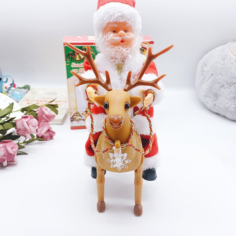 Decoratiune Mos Craciun, Animat, care Canta si Danseaza, cu Saculet, pe Ren, Imbracat Festiv, 28x21x10 cm, Rosu