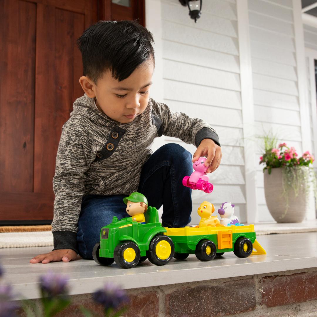 Tomy TRACTORAS CU REMORCA,ANIMALUTE SI SUNETE
