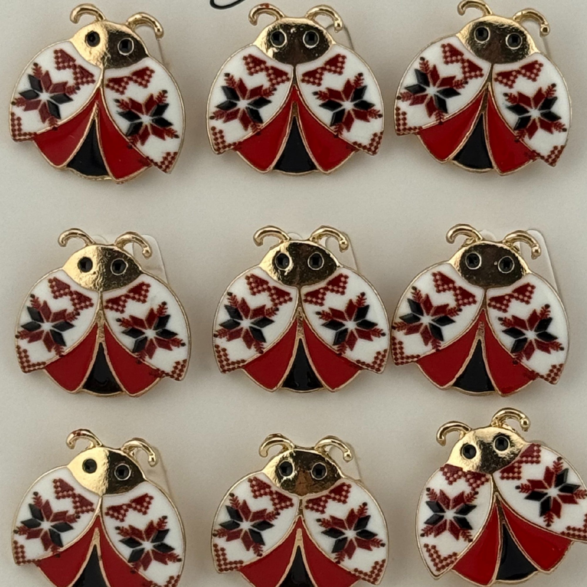 Set 12 Brose Martisor Primavara, Model Buburuza cu Motiv Traditional