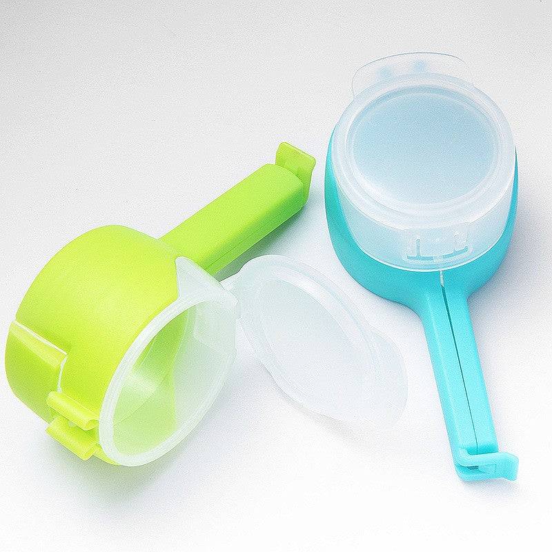 Set 4 cleme cu capac pentru sigilare pungi alimente, material ABS, multicolor