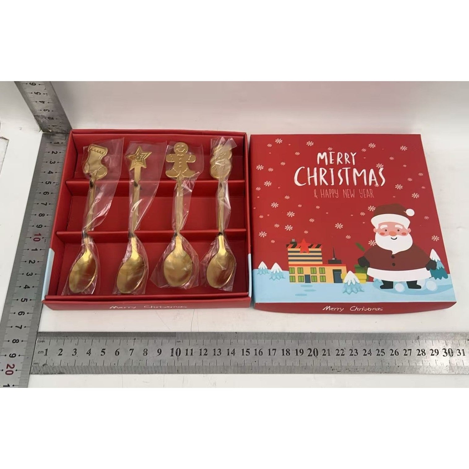 Set 4 Lingurite, Tema Craciun, din Otel Inoxidabil, 4 Modele Festive, Cutie Cadou, 14 x 14 x 2.5 cm, Auriu