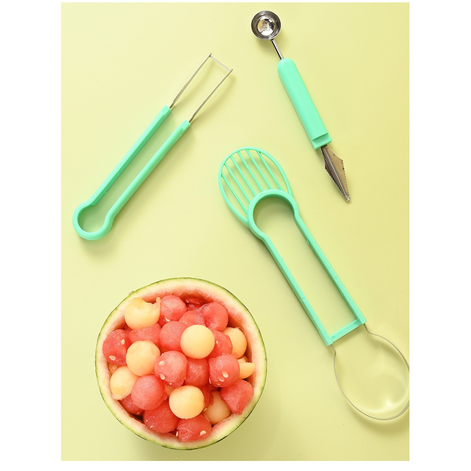 Ustensila bucatarie 4 in 1 pentru taiat si decorat fructe material inox si plastic, compact, 28x6.2 cm, verde