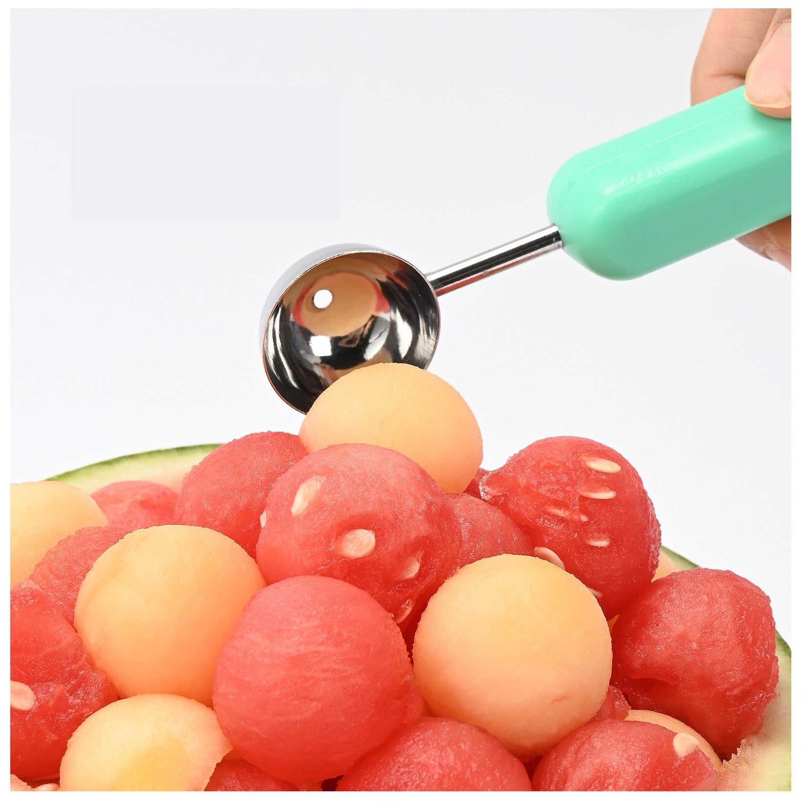 Ustensila bucatarie 4 in 1 pentru taiat si decorat fructe material inox si plastic, compact, 28x6.2 cm, verde